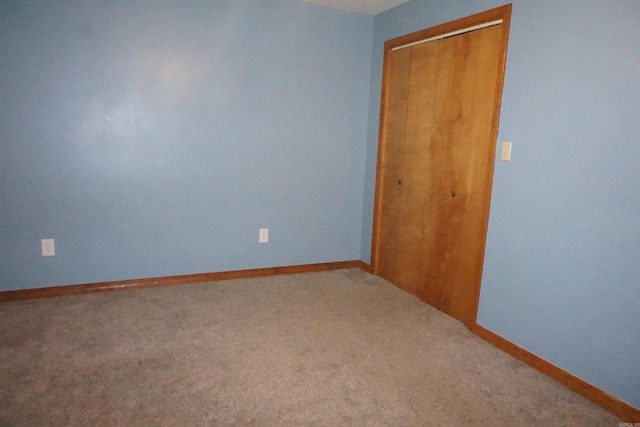 empty room featuring carpet floors