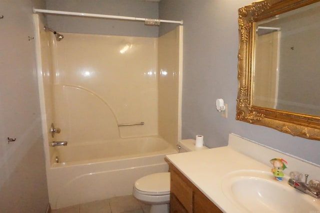 full bathroom featuring vanity, tub / shower combination, toilet, and tile patterned flooring