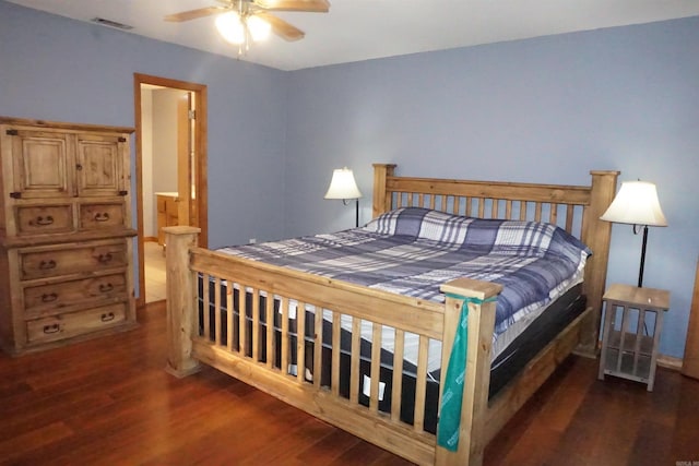 bedroom featuring ceiling fan and dark hardwood / wood-style flooring