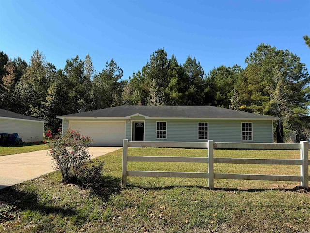 single story home with a front yard and a garage