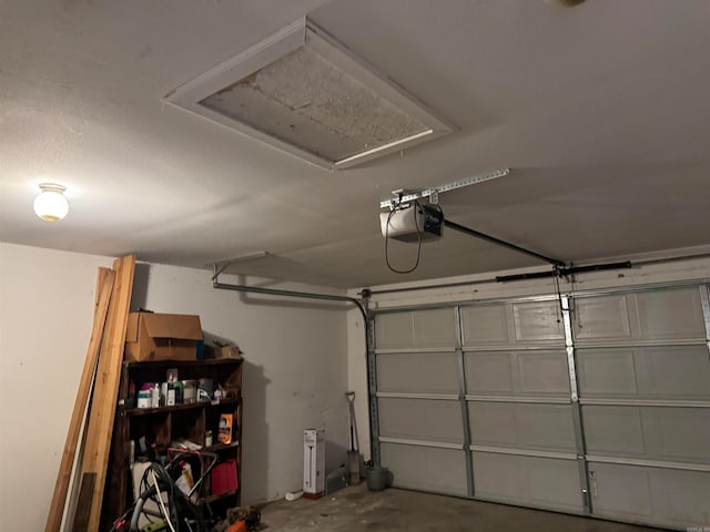 garage featuring a garage door opener