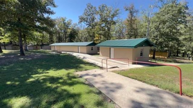 exterior space with a lawn