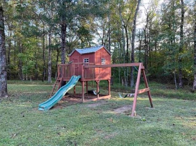 view of jungle gym with a yard