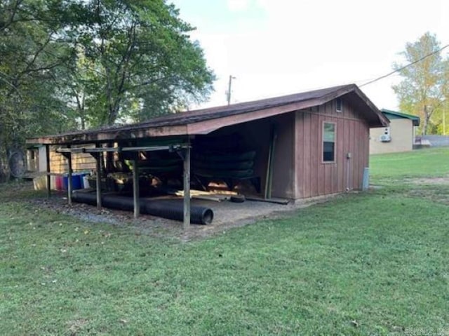 view of outdoor structure featuring a yard