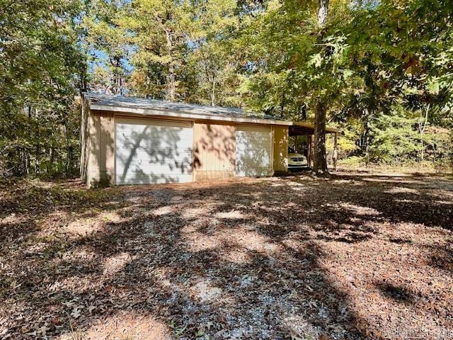 view of outbuilding featuring a garage