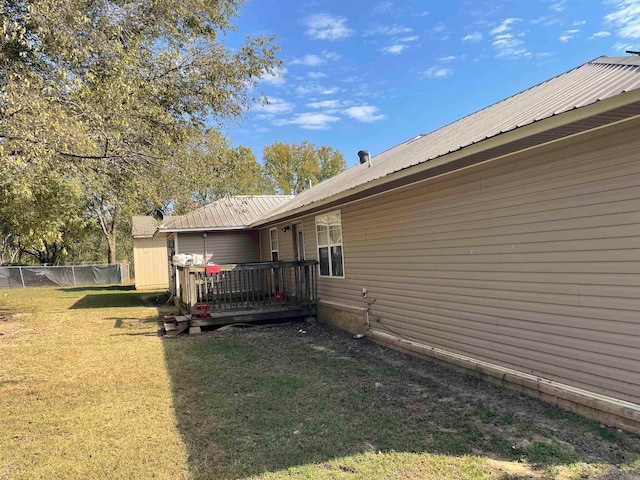 view of yard featuring a deck