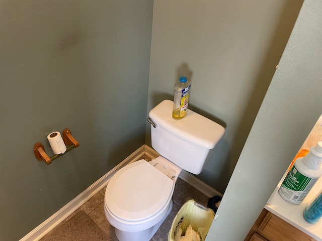 bathroom featuring toilet and tile patterned floors