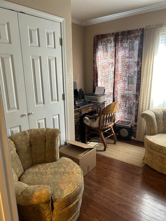 home office featuring crown molding and dark hardwood / wood-style floors