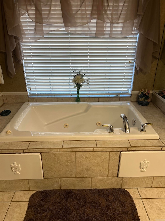 bathroom with tiled tub