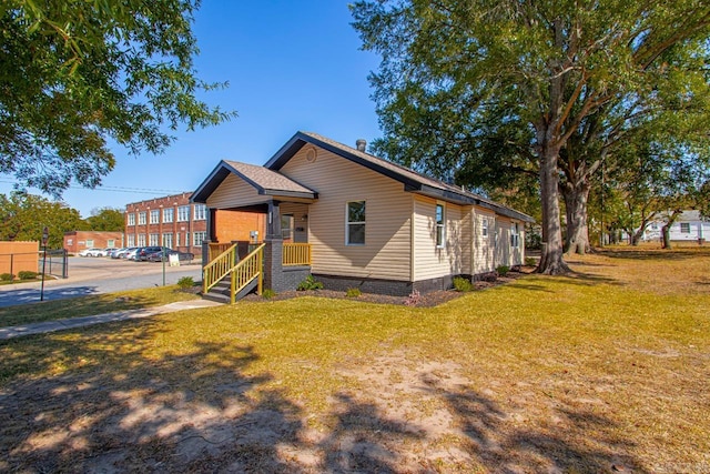 view of front of home featuring a front lawn