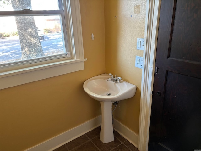 bathroom with tile patterned flooring