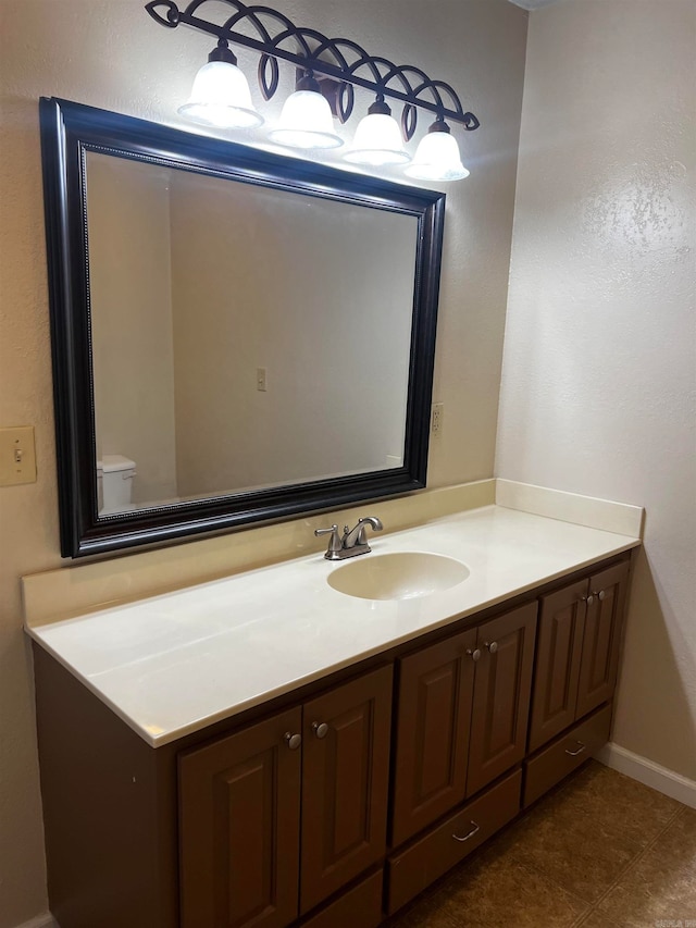 bathroom with vanity and tile patterned flooring