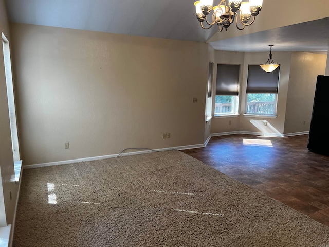 unfurnished dining area featuring a notable chandelier and dark hardwood / wood-style flooring