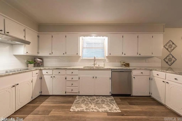 kitchen with dark wood-type flooring, white cabinets, stainless steel dishwasher, and sink