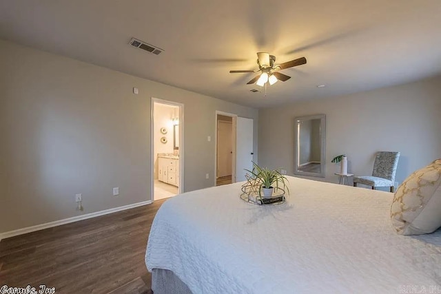 bedroom with dark hardwood / wood-style flooring, ensuite bath, and ceiling fan