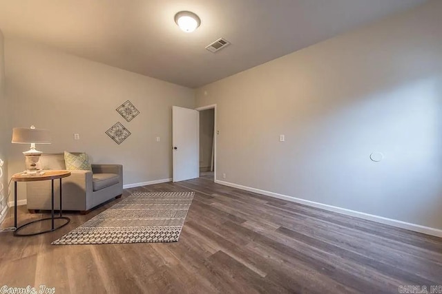 unfurnished room with dark hardwood / wood-style floors