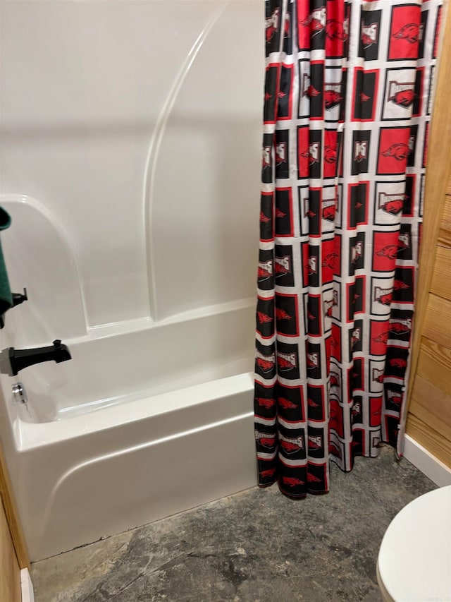 bathroom featuring toilet, shower / bath combination with curtain, and concrete flooring