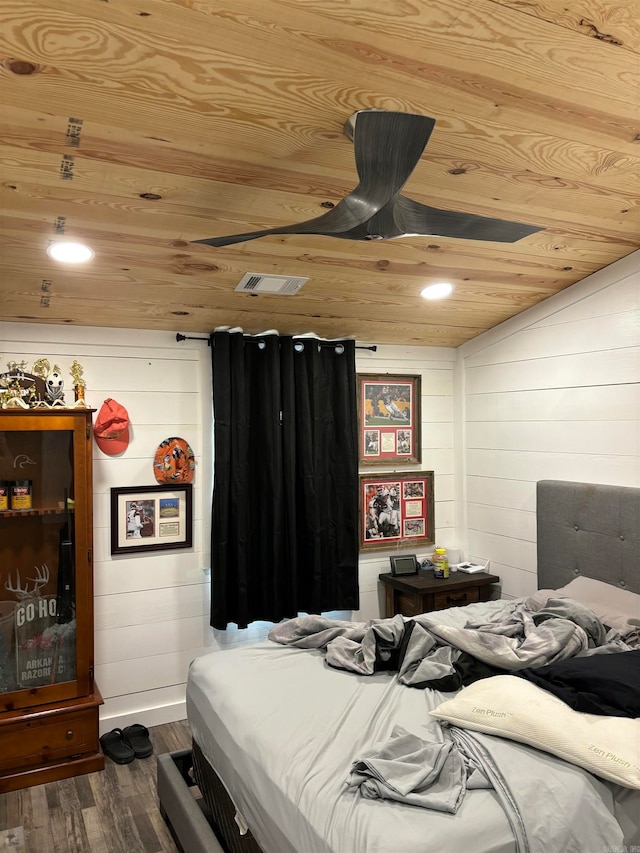 bedroom featuring wood walls, wooden ceiling, vaulted ceiling, and dark hardwood / wood-style floors