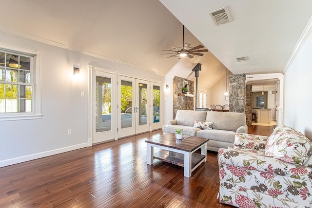 living room featuring french doors, crown molding, vaulted ceiling, dark hardwood / wood-style flooring, and ceiling fan