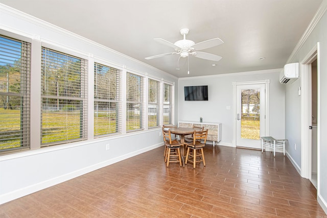 sunroom with a wall mounted AC and ceiling fan