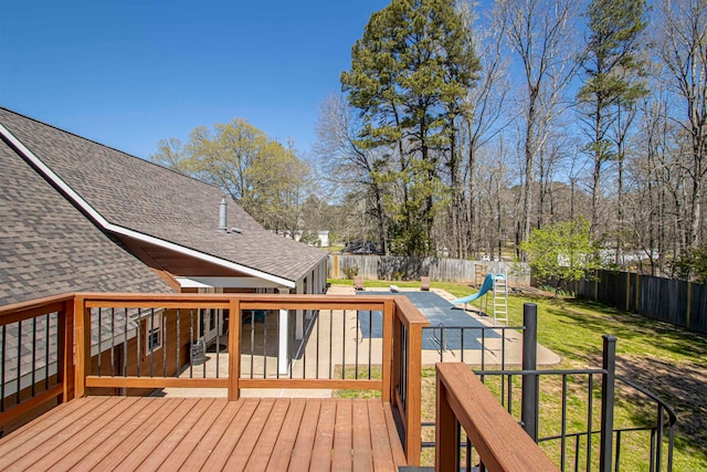 wooden deck with a lawn