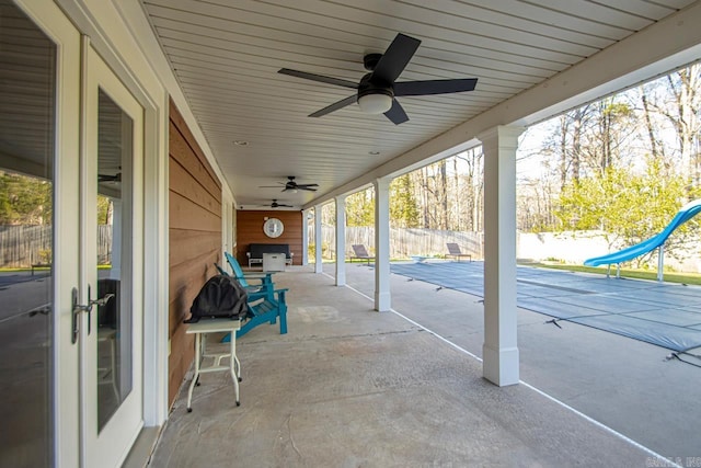 view of patio with ceiling fan