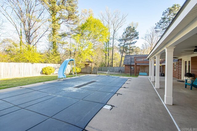 view of patio / terrace with a fenced backyard and ceiling fan