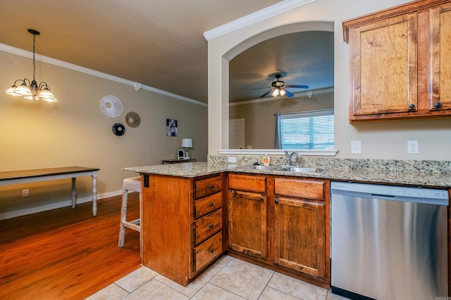 kitchen featuring kitchen peninsula, stainless steel dishwasher, light hardwood / wood-style flooring, ornamental molding, and ceiling fan with notable chandelier