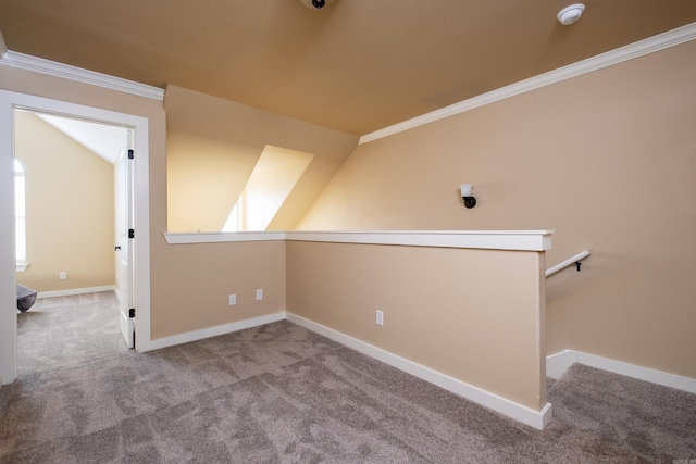 additional living space with vaulted ceiling, carpet floors, and plenty of natural light