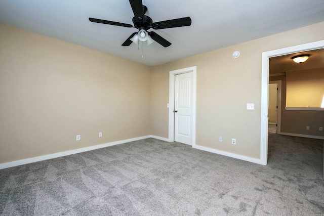 unfurnished bedroom featuring carpet floors and ceiling fan