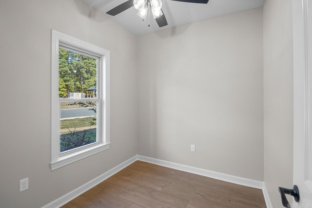 unfurnished room with ceiling fan and light hardwood / wood-style flooring