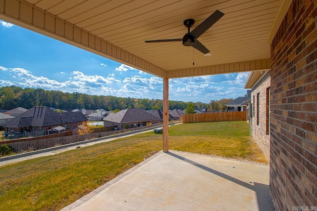 view of patio featuring ceiling fan