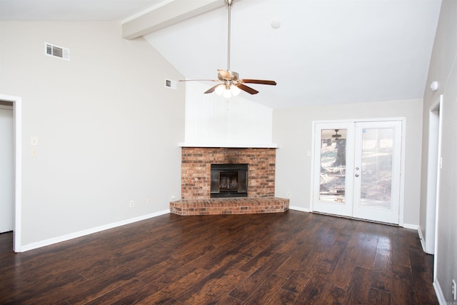 unfurnished living room featuring french doors, dark hardwood / wood-style flooring, a brick fireplace, ceiling fan, and high vaulted ceiling