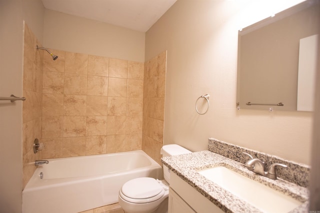 full bathroom with vanity, toilet, and tiled shower / bath combo