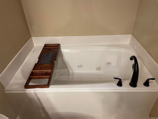 bathroom featuring a tub