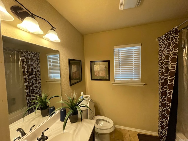 bathroom with vanity, toilet, tile patterned flooring, and a shower with shower curtain