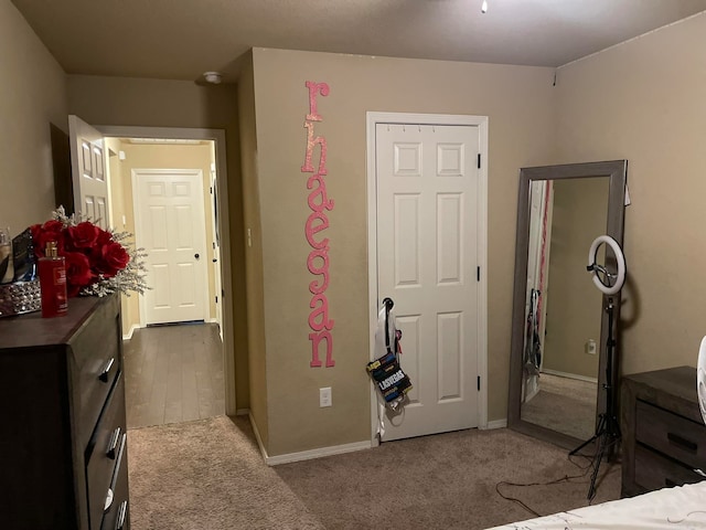 bedroom with light carpet