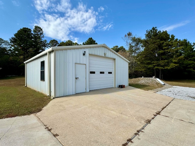 garage with a yard