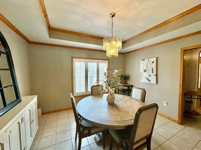 tiled dining room featuring crown molding, a notable chandelier, and a raised ceiling