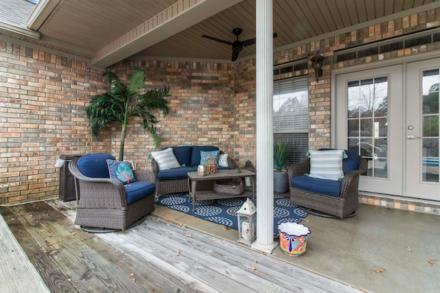 wooden terrace with french doors, an outdoor living space, and ceiling fan