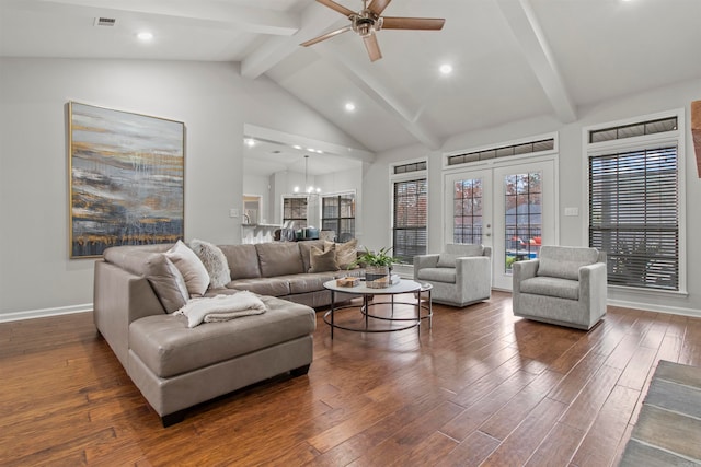 living room featuring ceiling fan with notable chandelier, french doors, vaulted ceiling with beams, and dark hardwood / wood-style floors