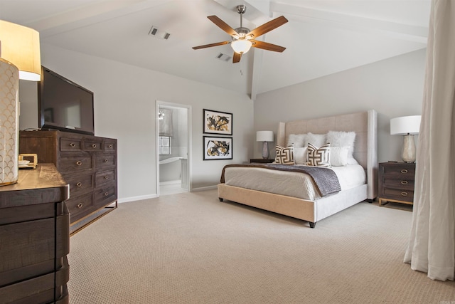 carpeted bedroom featuring ensuite bath, lofted ceiling with beams, and ceiling fan