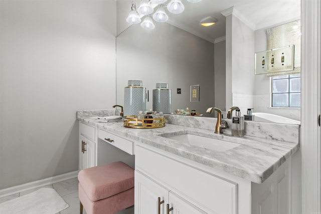 bathroom with vanity and ornamental molding