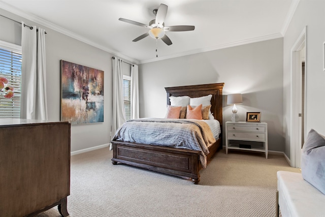 bedroom with ceiling fan, light carpet, and crown molding