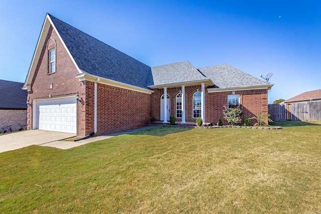 18 Emma Dr, Cabot, AR 72023 - view of front facade featuring roof with shingles, driveway, brick siding, and a garage