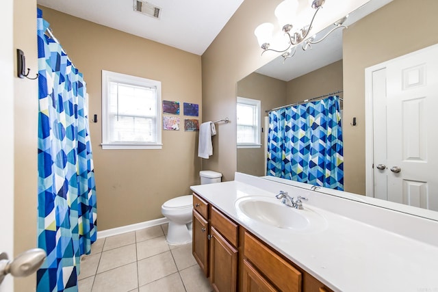 18 Emma Dr, Cabot, AR 72023 - full bathroom with a chandelier, toilet, vanity, tile patterned floors, and baseboards