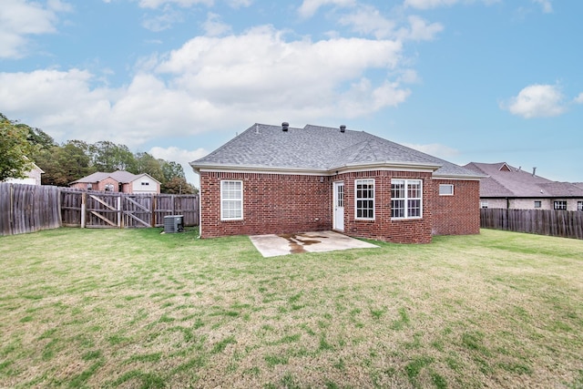 18 Emma Dr, Cabot, AR 72023 - rear view of property with brick siding, central AC, a patio, and a shingled roof