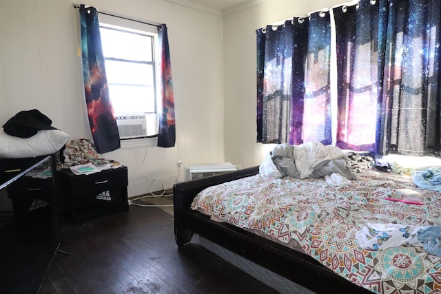 bedroom featuring cooling unit and hardwood / wood-style flooring