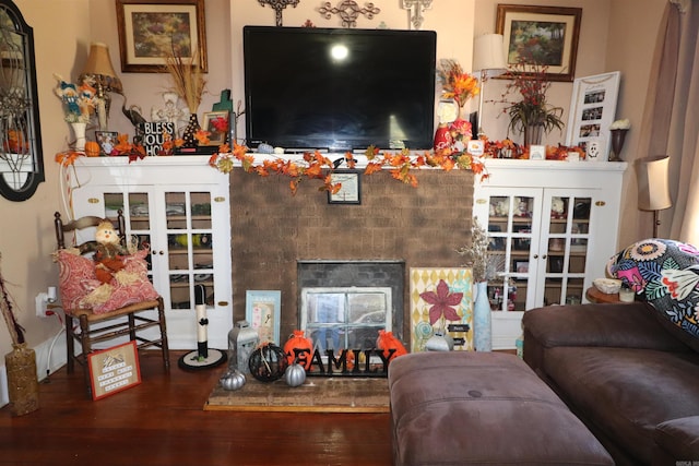 living room with french doors and hardwood / wood-style flooring