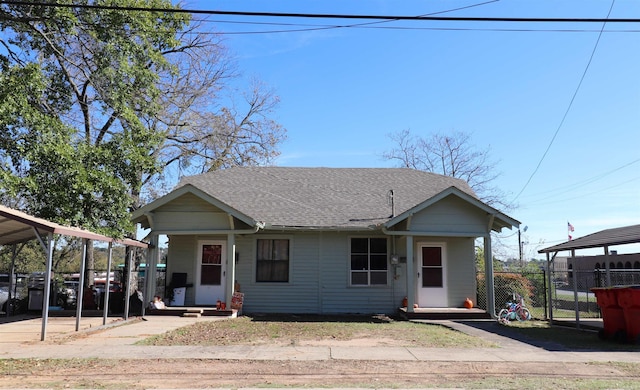 view of front facade featuring a carport and covered porch